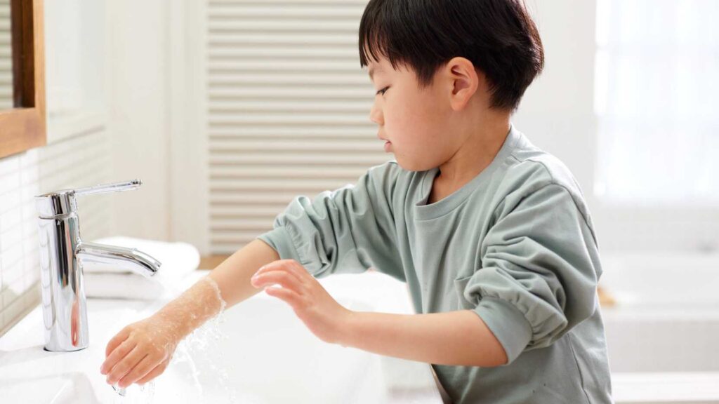 Teaching handwashing to a child with autism using a structured routine at the sink